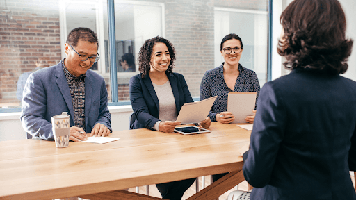 Employers interviewing an applicant.