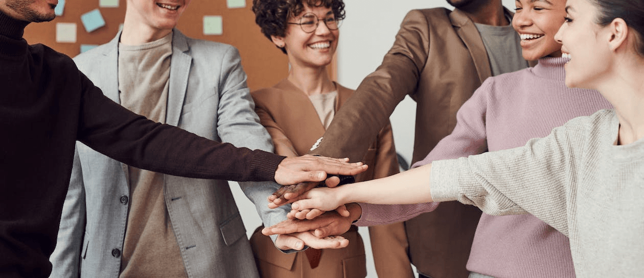 People joined hands showing teamwork