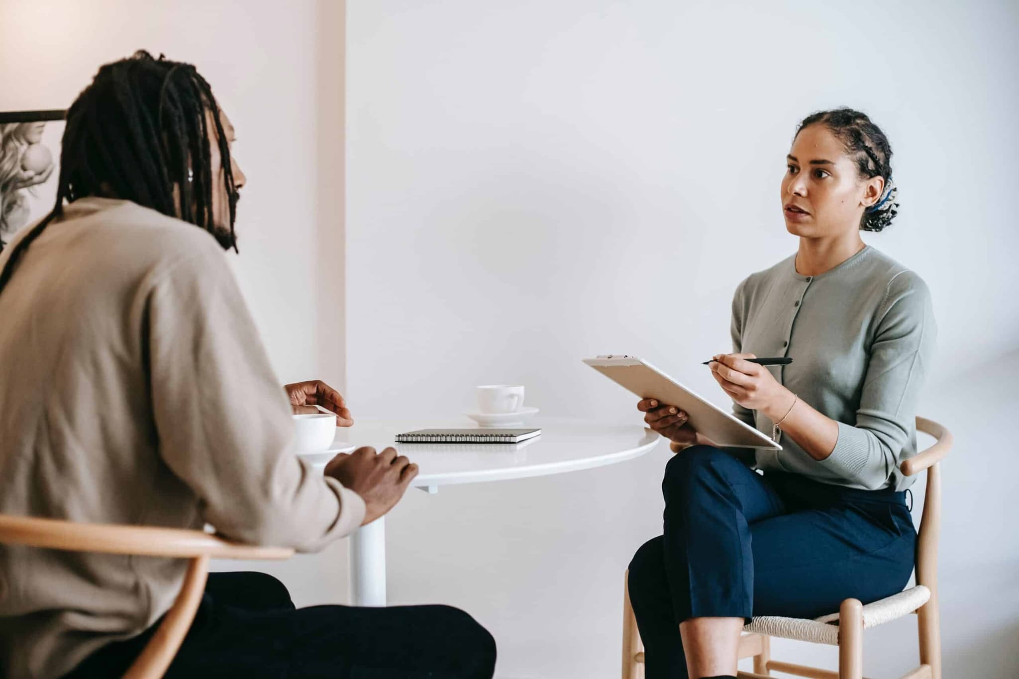 a woman and a man at a job interview do you have any questions for us